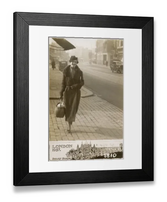 Framed Print : London Lady Marion strolling along a London Street Framed Print : London Lady Marion strolling along a London Street