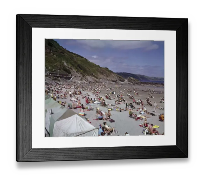 Framed Print : Holidaymakers on the beach at Looe, Cornwall Framed Print : Holidaymakers on the beach at Looe, Cornwall
