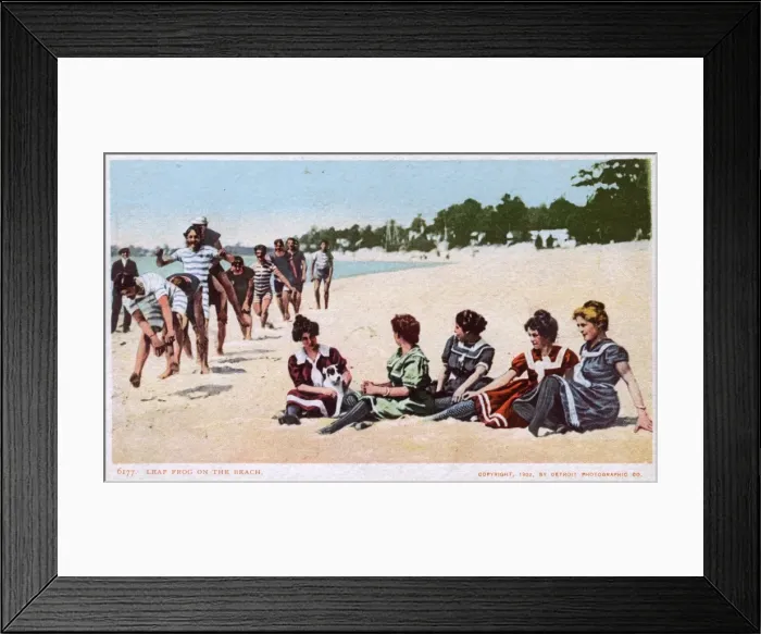 Framed Print : Beach scene, men playing leapfrog, women watching Framed Print : Beach scene, men playing leapfrog, women watching