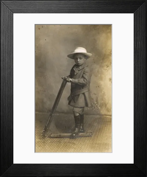Framed Print : Little boy with scooter, c. 1900 Framed Print : Little boy with scooter, c. 1900