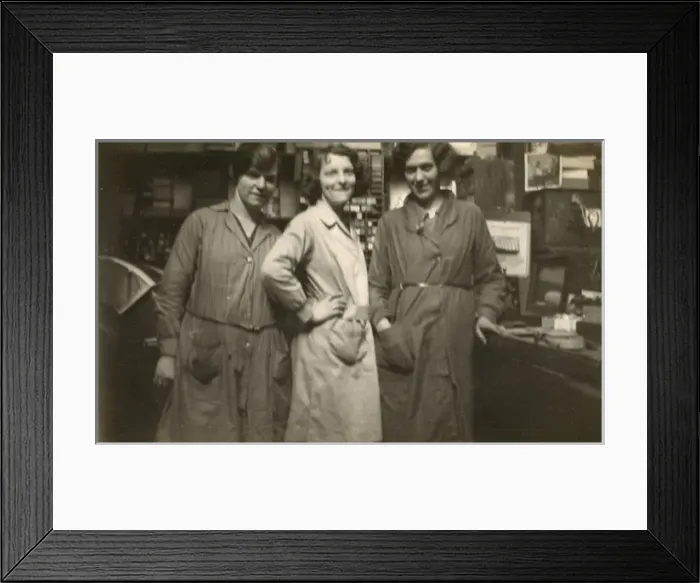 Framed Print : Three women in a small business - wearing overalls