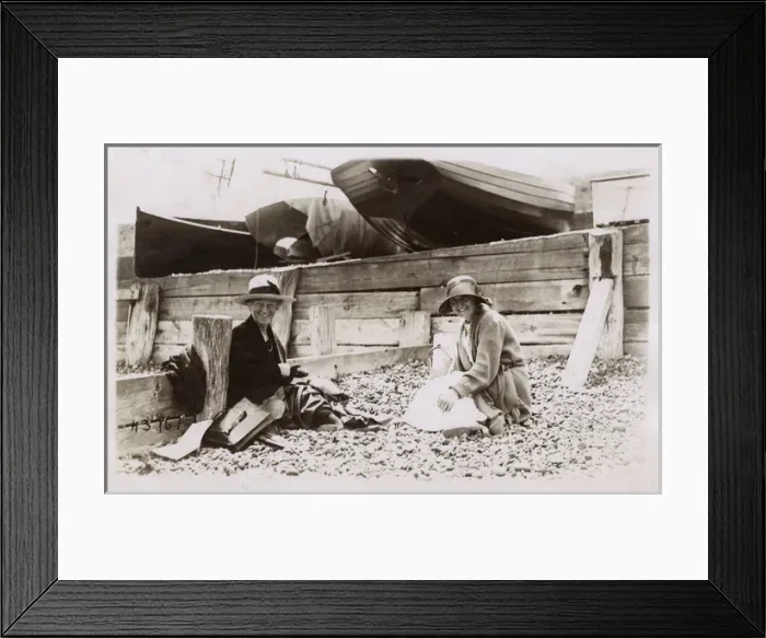 Framed Print : Mother and Daughter on a shingle beach near fishing boats Framed Print : Mother and Daughter on a shingle beach near fishing boats