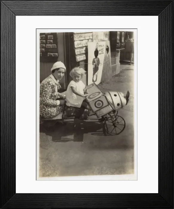Framed Print : Brighton - Mother and daughter pose in Toy aeroplane Framed Print : Brighton - Mother and daughter pose in Toy aeroplane