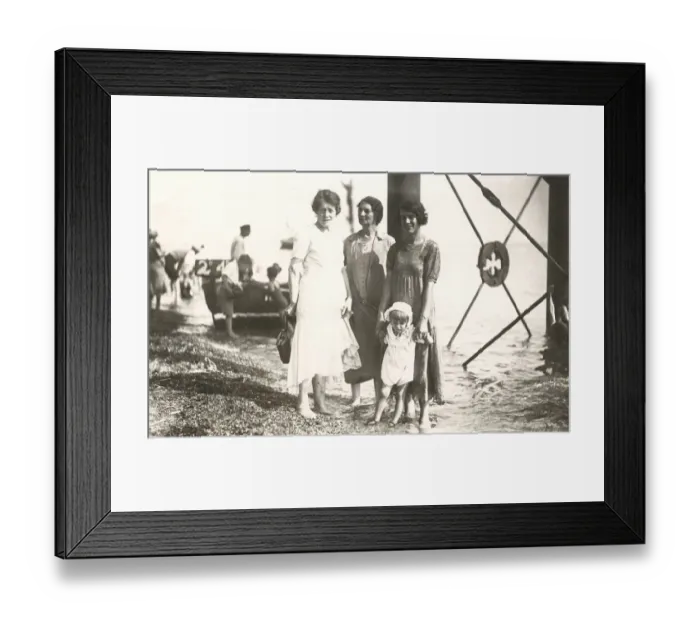 Framed Print : Candid seaside photograph - 3 women and child - under pier Framed Print : Candid seaside photograph - 3 women and child - under pier