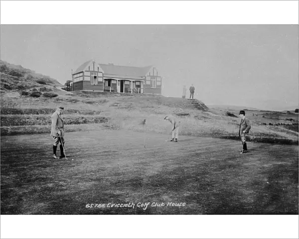 Criccieth Golf Club House, with people playing