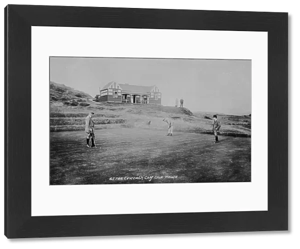 Criccieth Golf Club House, with people playing