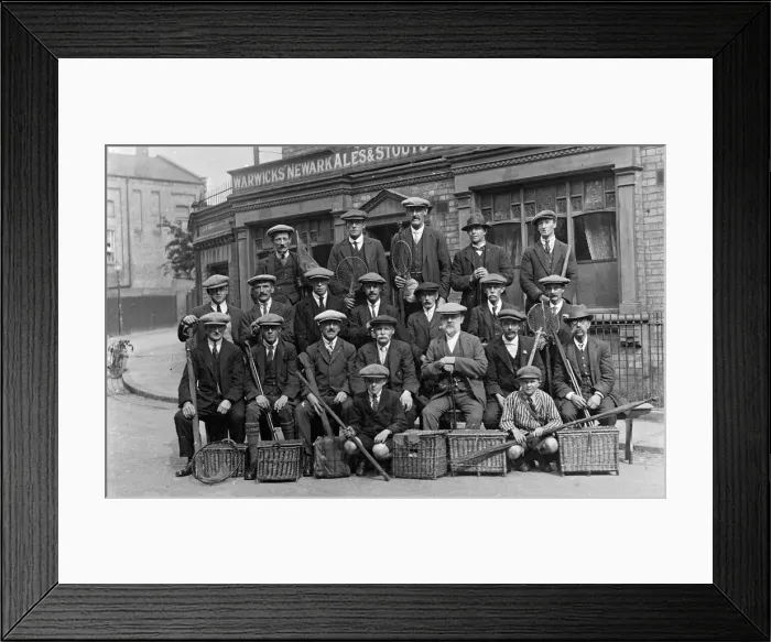 Framed Print : Group of fishermen with baskets and rods outside a pub Framed Print : Group of fishermen with baskets and rods outside a pub