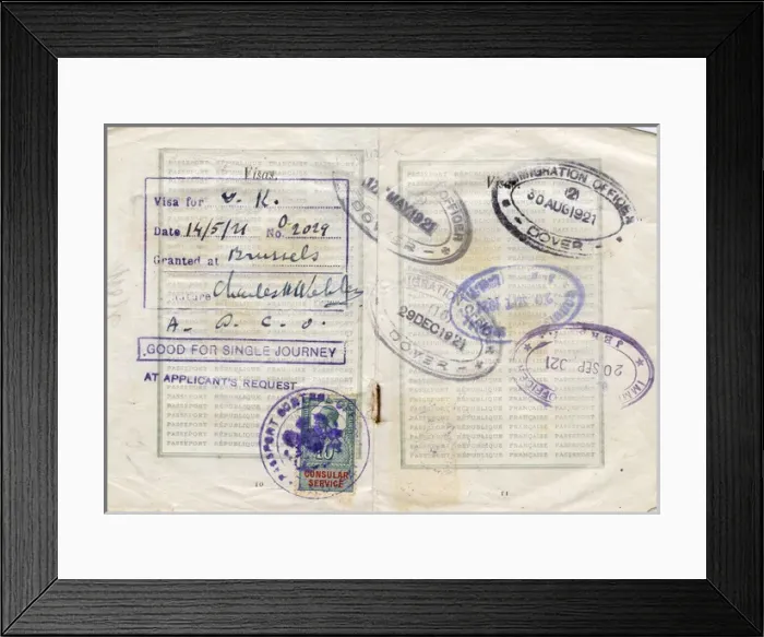 Framed Print : Visa pages with stamps in a French passport Framed Print : Visa pages with stamps in a French passport