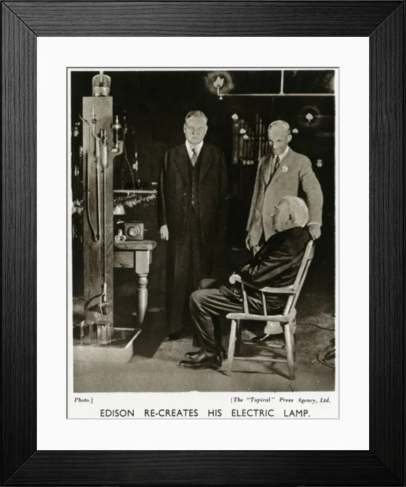 Framed Print : Thomas Edison re-creates his electric lamp Framed Print : Thomas Edison re-creates his electric lamp