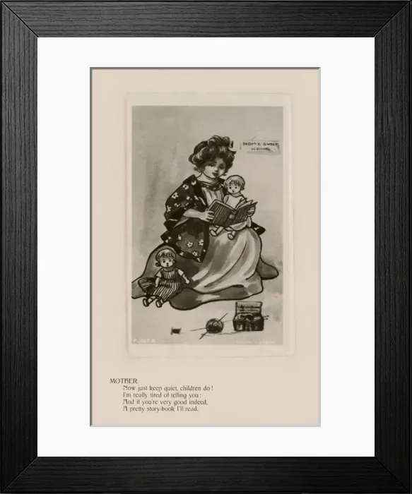 Framed Print : Mother. Pretty young girl pretending to be mother reading to her dolls Framed Print : Mother. Pretty young girl pretending to be mother reading to her dolls