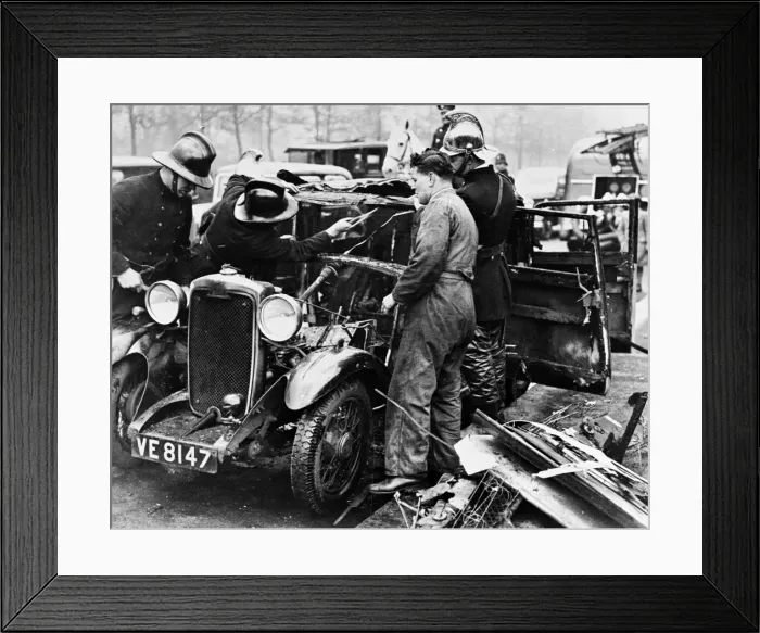 Framed Print : Firemen and mechanic with burnt-out car, London Framed Print : Firemen and mechanic with burnt-out car, London