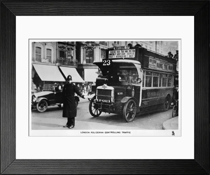 Framed Print : Policeman controlling traffic, Oxford Street, London Framed Print : Policeman controlling traffic, Oxford Street, London
