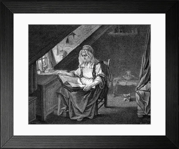 Framed Print : Woman reading in a French attic bedroom Framed Print : Woman reading in a French attic bedroom