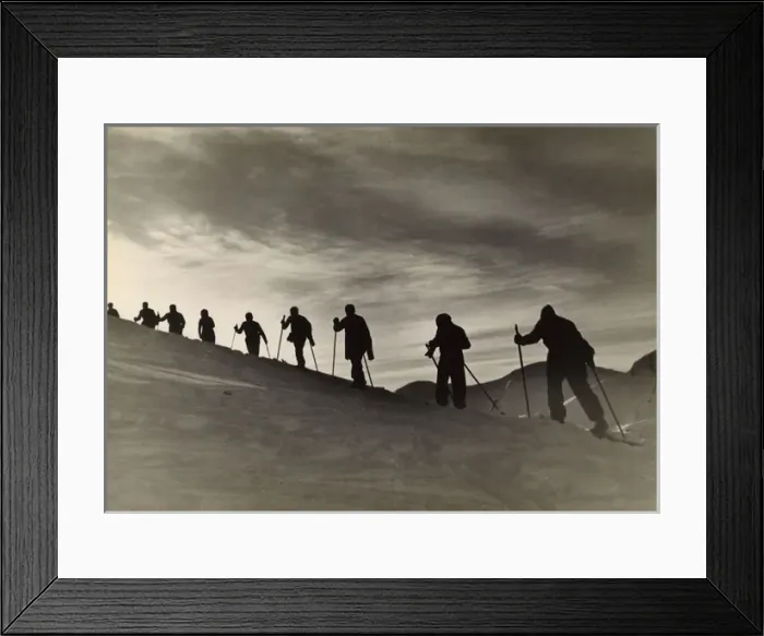 Framed Print : Skiers Climbing Hill Framed Print : Skiers Climbing Hill