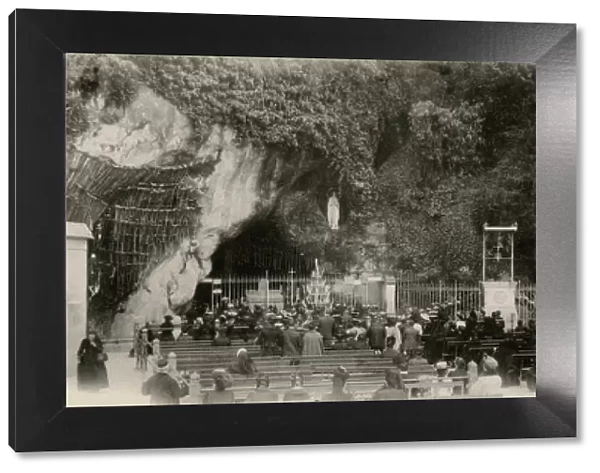 Pilgrims at the Grotto, Lourdes, France