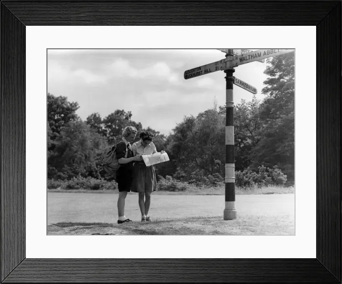 Framed Print : Two Girls & Signpost Framed Print : Two Girls & Signpost
