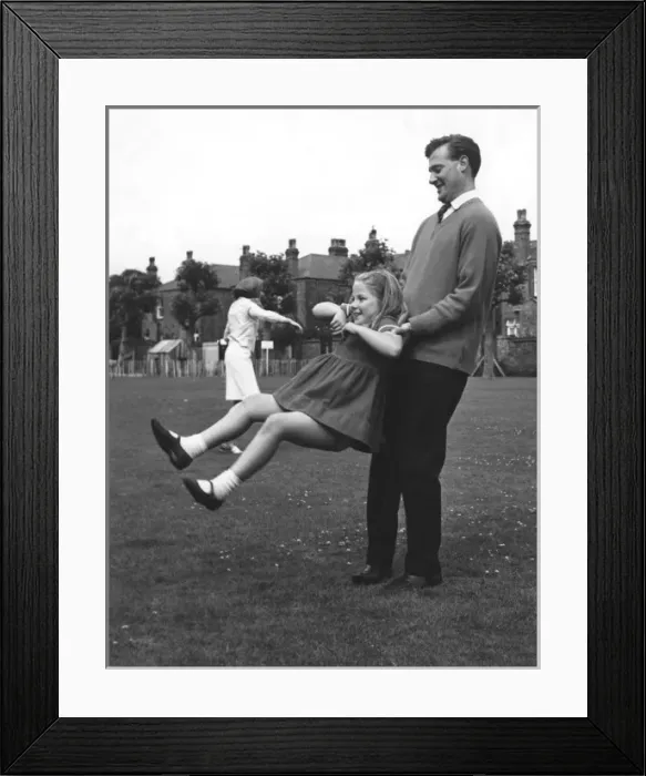 Framed Print : Father Swings Daughter Framed Print : Father Swings Daughter