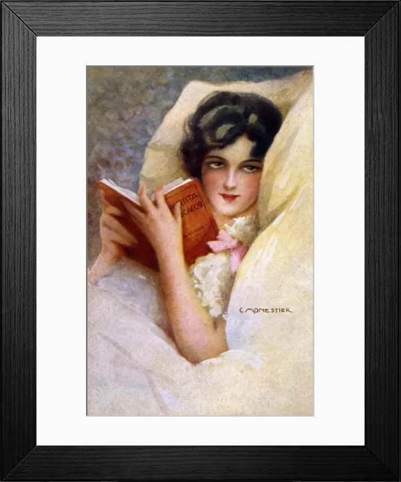 Framed Print : Woman Reads Novel in Bed Framed Print : Woman Reads Novel in Bed
