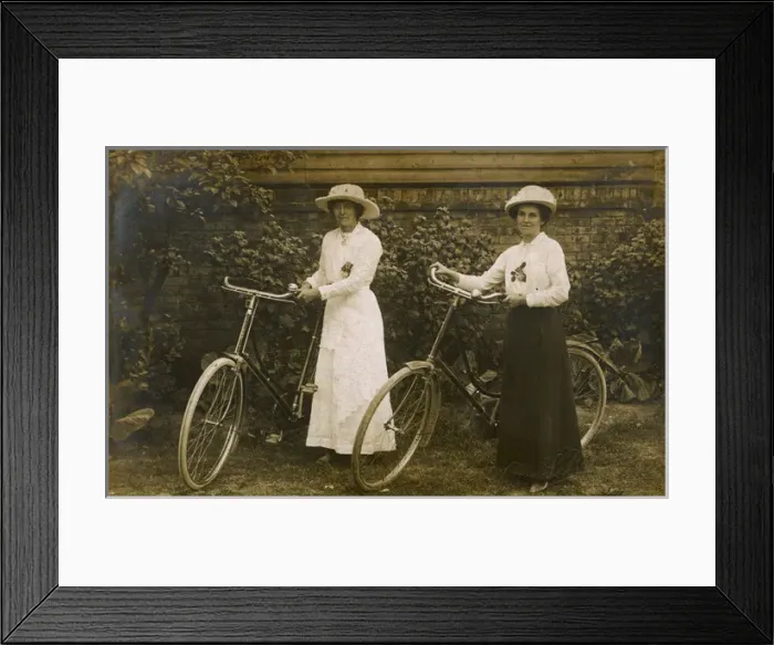Framed Print : Two Ladies and Bikes Framed Print : Two Ladies and Bikes