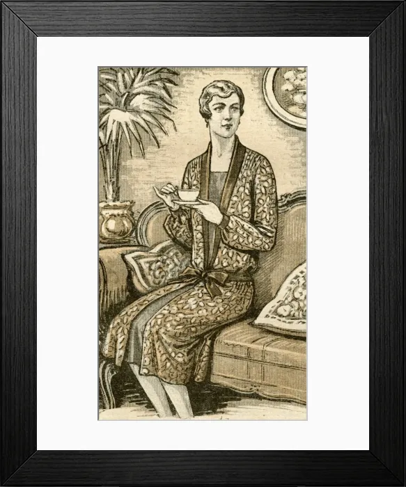 Framed Print : Woman Drinks Tea on Sofa Framed Print : Woman Drinks Tea on Sofa
