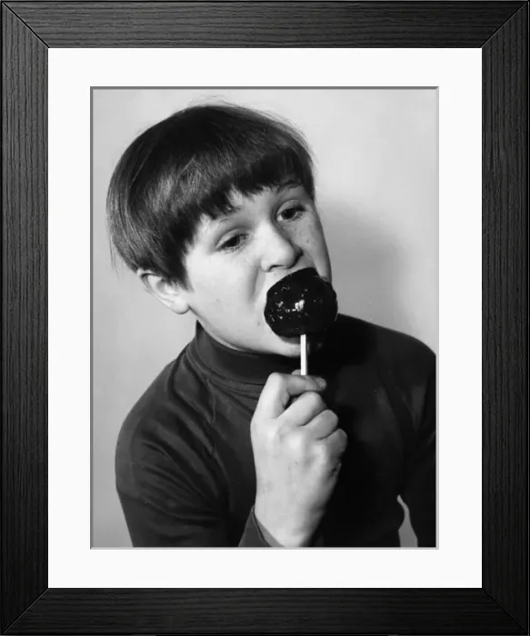 Framed Print : Boy Eats Toffee Apple Framed Print : Boy Eats Toffee Apple
