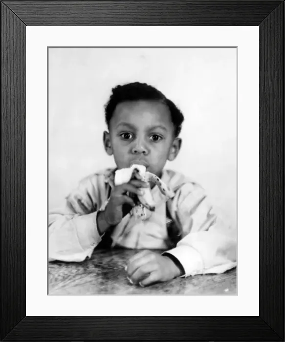 Framed Print : Boy Eating a Banana Framed Print : Boy Eating a Banana