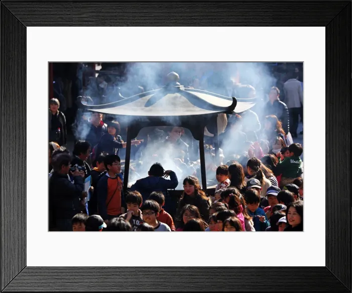 Framed Print : People burning incense at Senso Ji Temple in Asakusa, Tokyo Framed Print : People burning incense at Senso Ji Temple in Asakusa, Tokyo