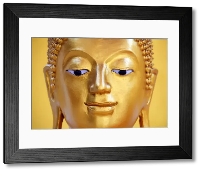 Framed Print : Gold Buddha statue head Wat Panping Temple, Chiang Mai Framed Print : Gold Buddha statue head Wat Panping Temple, Chiang Mai