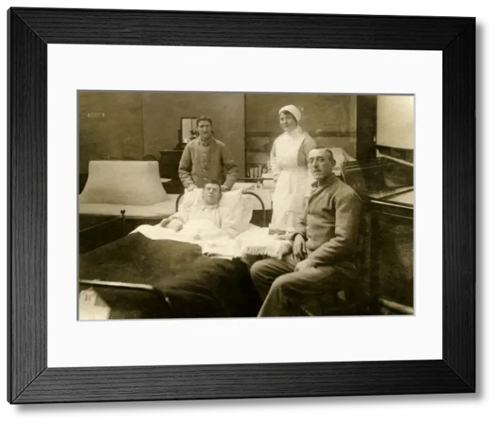 Framed Print : Three Patients (one in bed) with nurses Framed Print : Three Patients (one in bed) with nurses