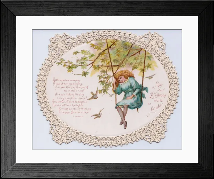 Framed Print : Girl sitting on a swing on a Christmas card Framed Print : Girl sitting on a swing on a Christmas card