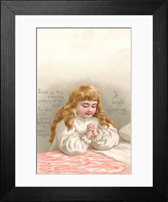 Framed Print : Girl praying by her bed on a Christmas card Framed Print : Girl praying by her bed on a Christmas card