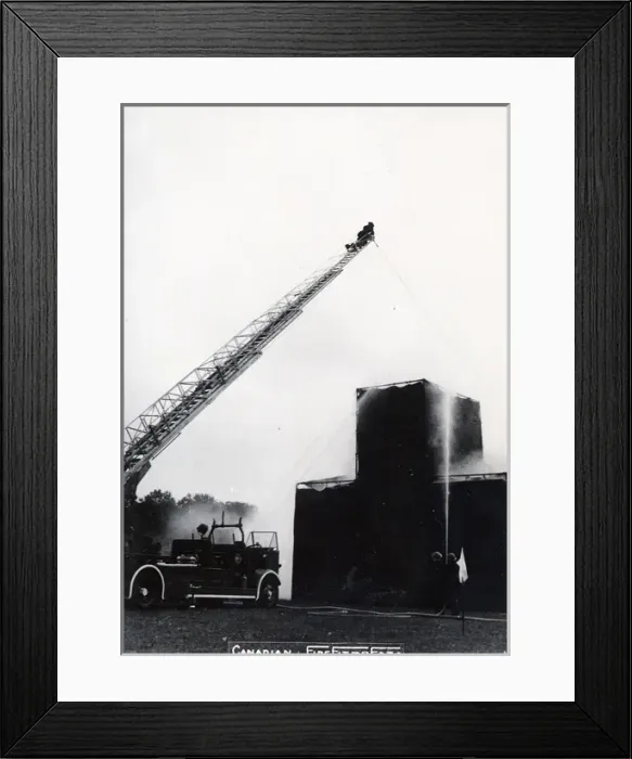 Framed Print : Training. Ladder drill and fire-fighting training on a mocked up building Framed Print : Training. Ladder drill and fire-fighting training on a mocked up building