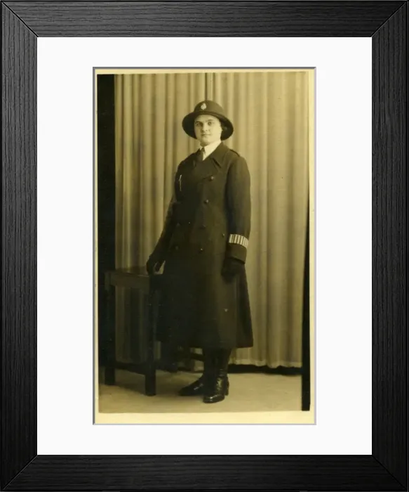 Framed Print : Woman police officer in studio photo Framed Print : Woman police officer in studio photo