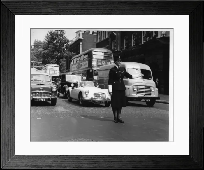 Framed Print : Woman police officer on traffic duty, London Framed Print : Woman police officer on traffic duty, London