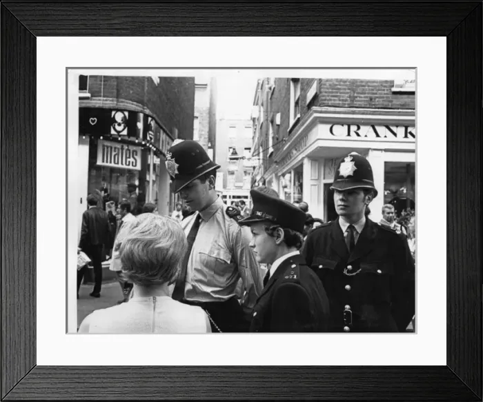 Framed Print : Woman police officer in street, London Framed Print : Woman police officer in street, London