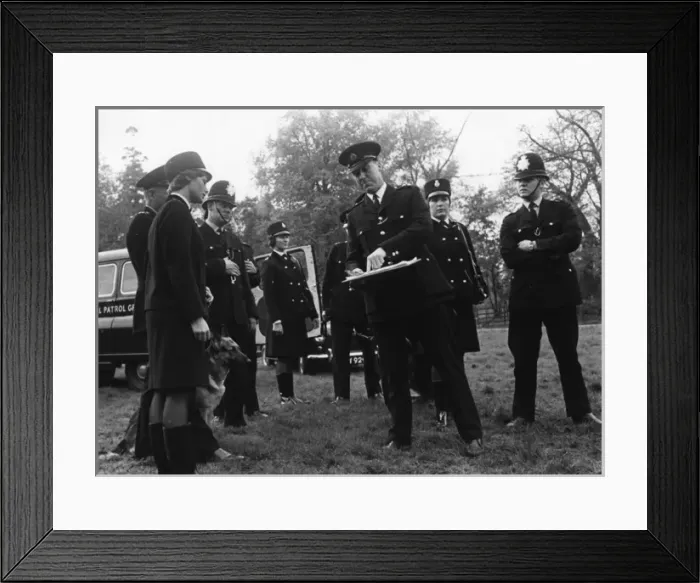 Framed Print : Police officers preparing to conduct a search, London Framed Print : Police officers preparing to conduct a search, London