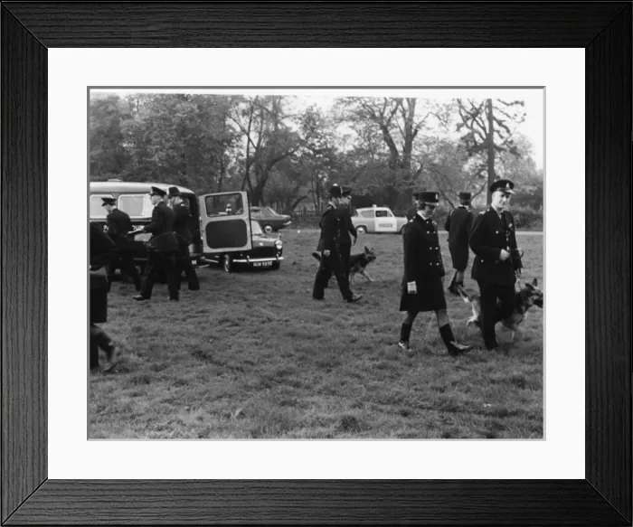 Framed Print : Police officers with dogs, conducting a search, London Framed Print : Police officers with dogs, conducting a search, London