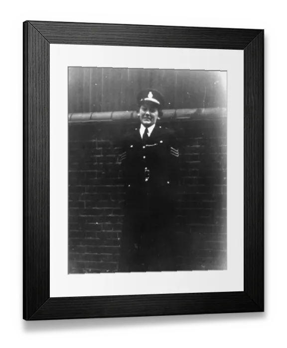 Framed Print : Woman police officer outside Peel House, London Framed Print : Woman police officer outside Peel House, London