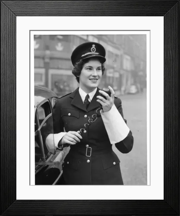 Framed Print : Woman police officer on traffic duty, London Framed Print : Woman police officer on traffic duty, London