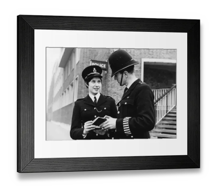 Framed Print : Male and female police officers in a London street Framed Print : Male and female police officers in a London street