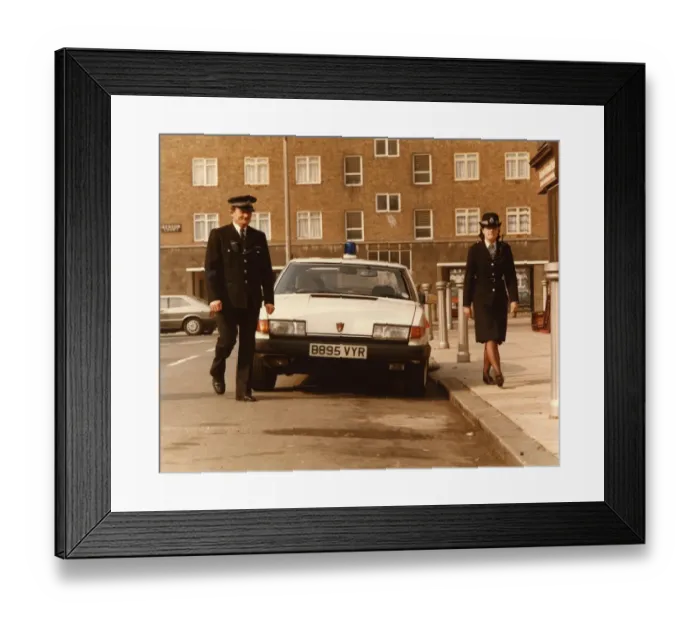 Framed Print : Male and female police officers in a London street Framed Print : Male and female police officers in a London street
