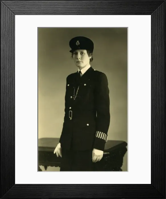 Framed Print : Woman police officer in studio photo Framed Print : Woman police officer in studio photo