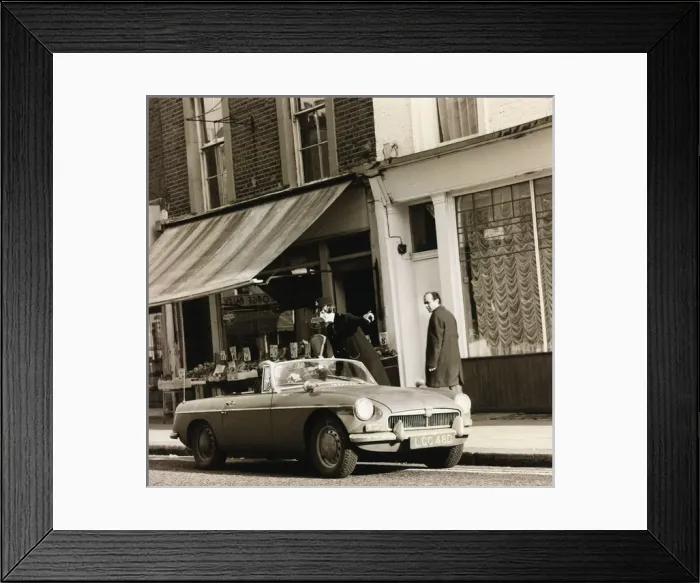 Framed Print : Woman police officer with car driver on a London street Framed Print : Woman police officer with car driver on a London street