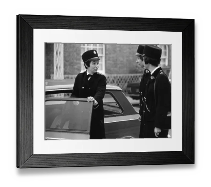 Framed Print : Three women police officers standing by a car, London Framed Print : Three women police officers standing by a car, London