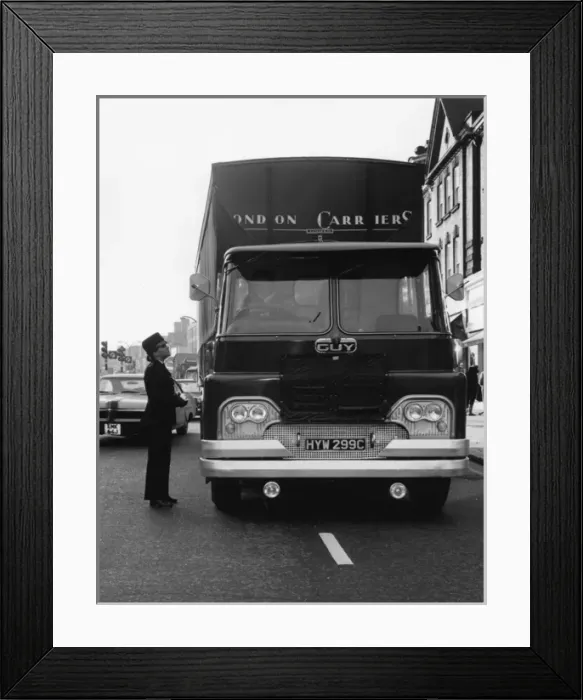 Framed Print : Woman police officer on duty in London Framed Print : Woman police officer on duty in London