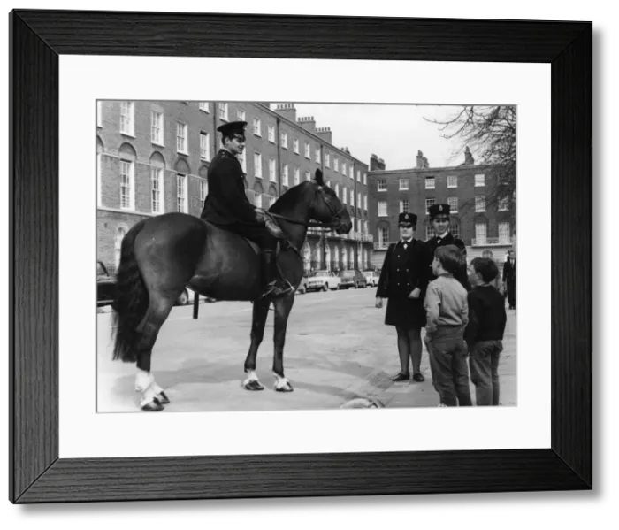 Framed Print : Two women police officers on duty in London Framed Print : Two women police officers on duty in London