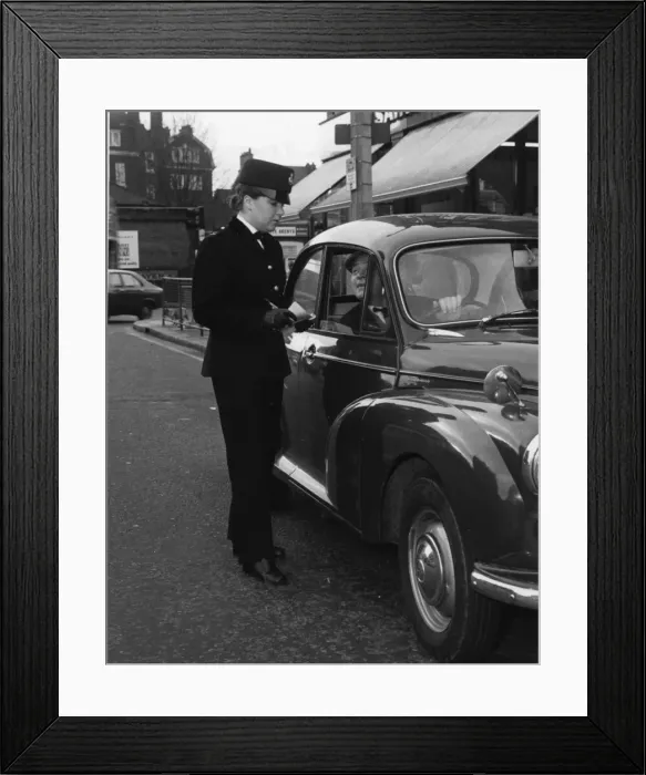Framed Print : Woman police officer on duty in London Framed Print : Woman police officer on duty in London