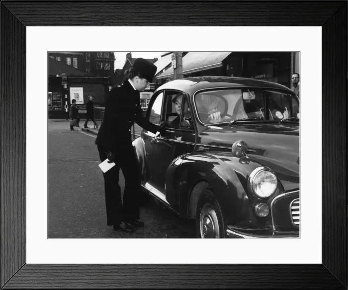 Framed Print : Woman police officer on duty in London Framed Print : Woman police officer on duty in London