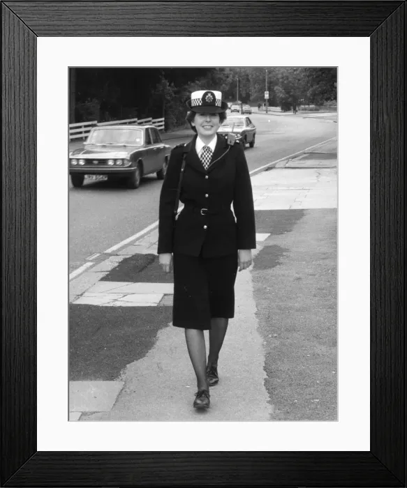 Framed Print : Woman police officer on duty in London Framed Print : Woman police officer on duty in London
