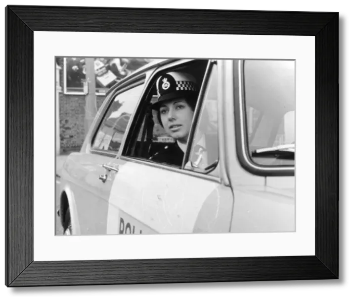 Framed Print : Woman police officer on duty in London Framed Print : Woman police officer on duty in London